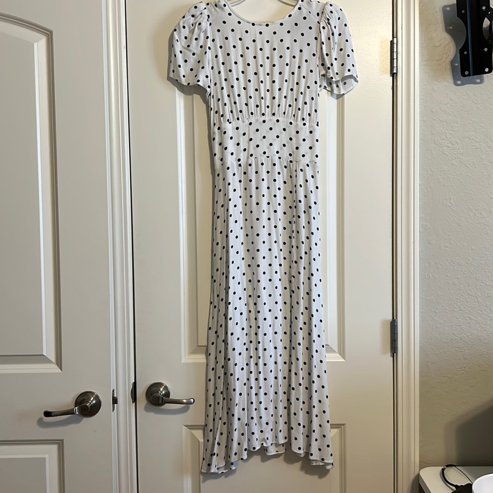 Black and white polkadot mini dress. Backless.